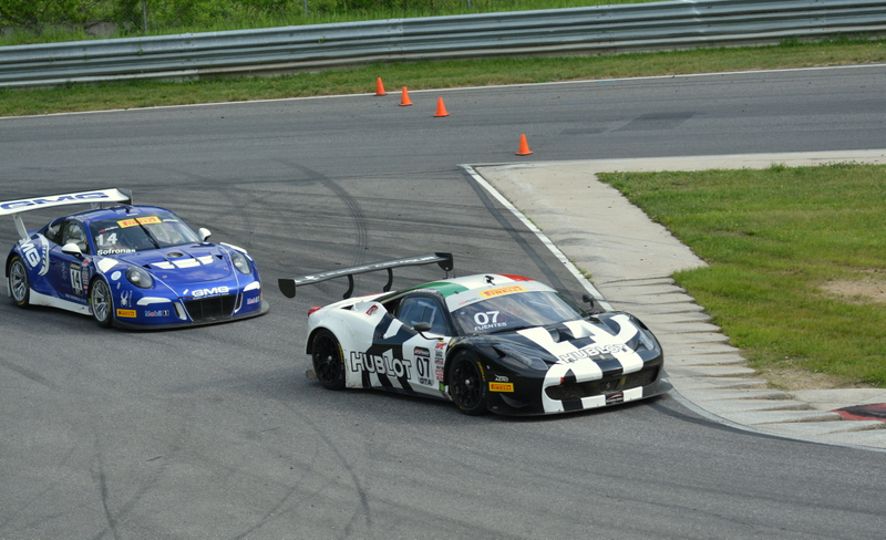 Martin Fuentes’ Scuderia Corsa Ferrari 458 Italia GT3 leads James Sofronas’ GMG Rading Porsche 911 GT3 R
